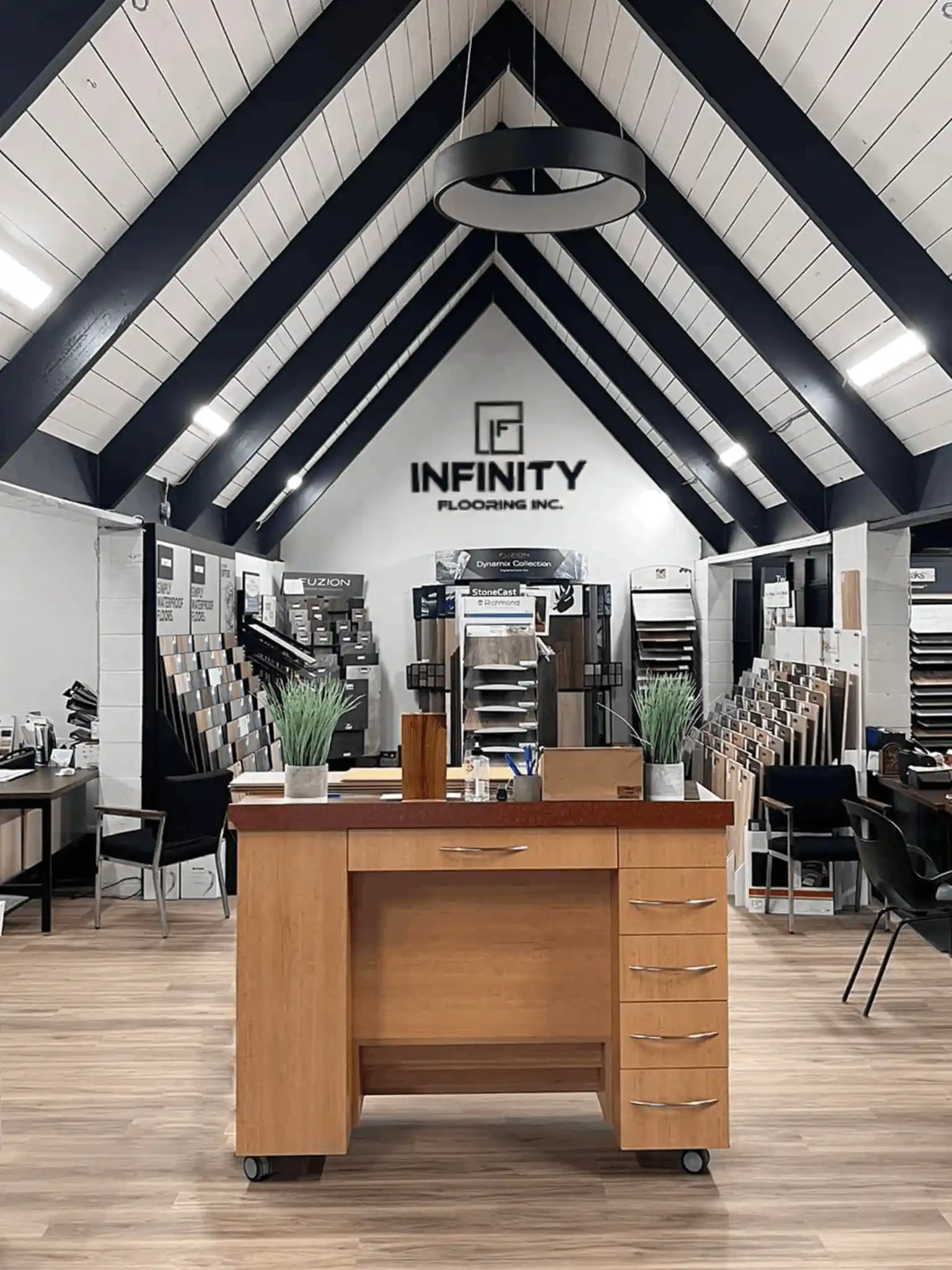 New owners shaking hands with previous owner